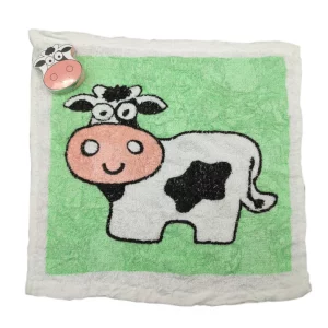 ausgepacktes Zauberhandtuch mit dem Motiv einer Kuh